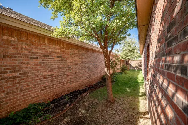 a view of a backyard with green space