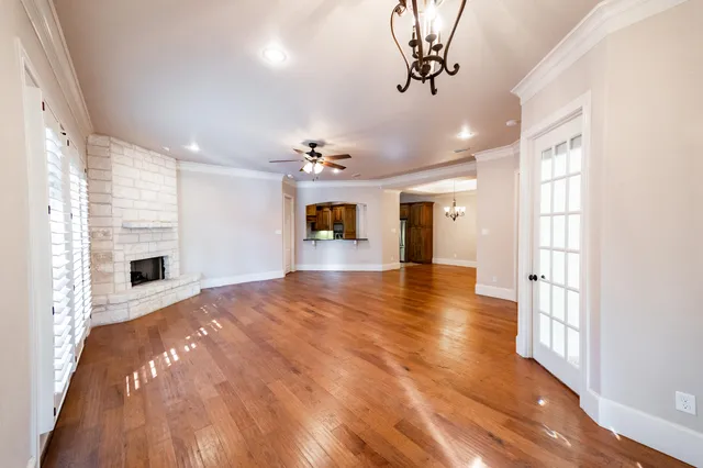 a view of a livingroom with wooden floor