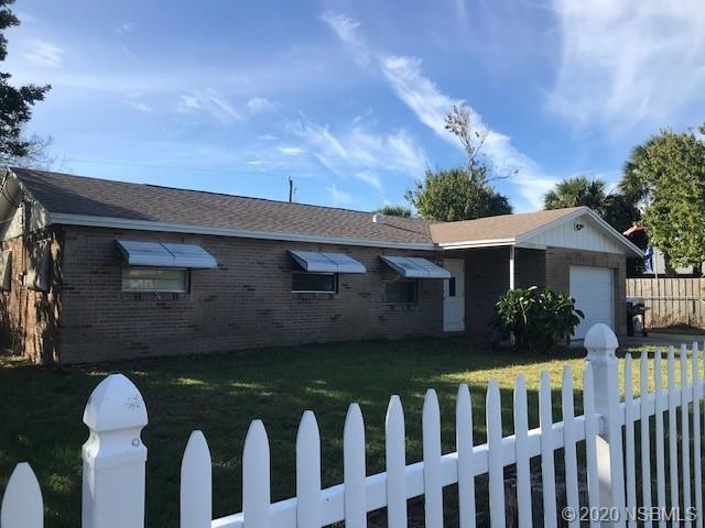 1600 Bradford Road Edgewater, FL 32132 - Photo 1 of 7 a front view of a house with yard