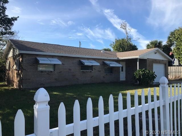 1600 Bradford Road Edgewater, FL 32132 - Photo 2 of 7 a front view of a house with a yard