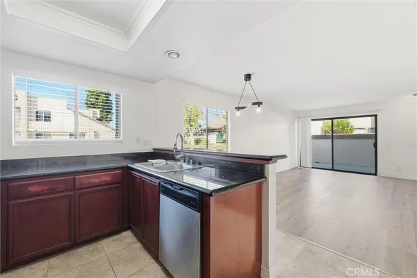 a kitchen with a stove and a sink