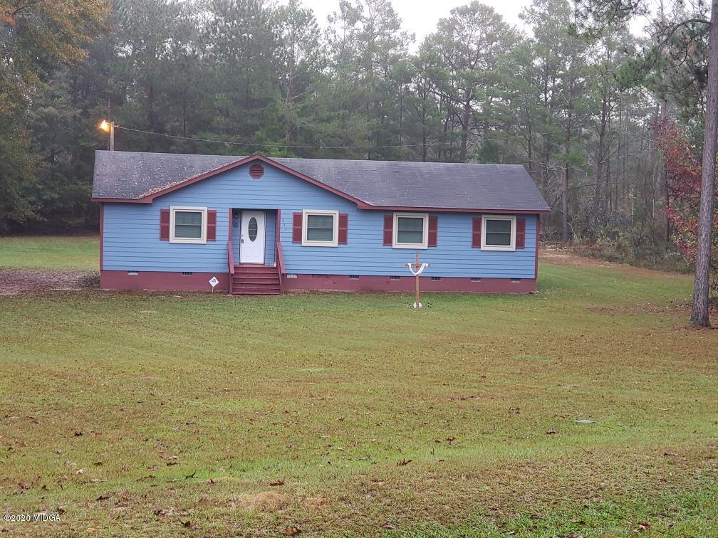 245 Pope Road Roberta, GA 31078 - Photo 1 of 8 a view of a house with a yard