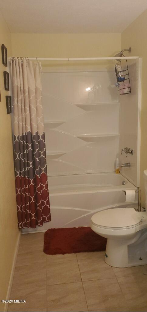 245 Pope Road Roberta, GA 31078 - Photo 7 of 8 a bathroom with a toilet and a shower