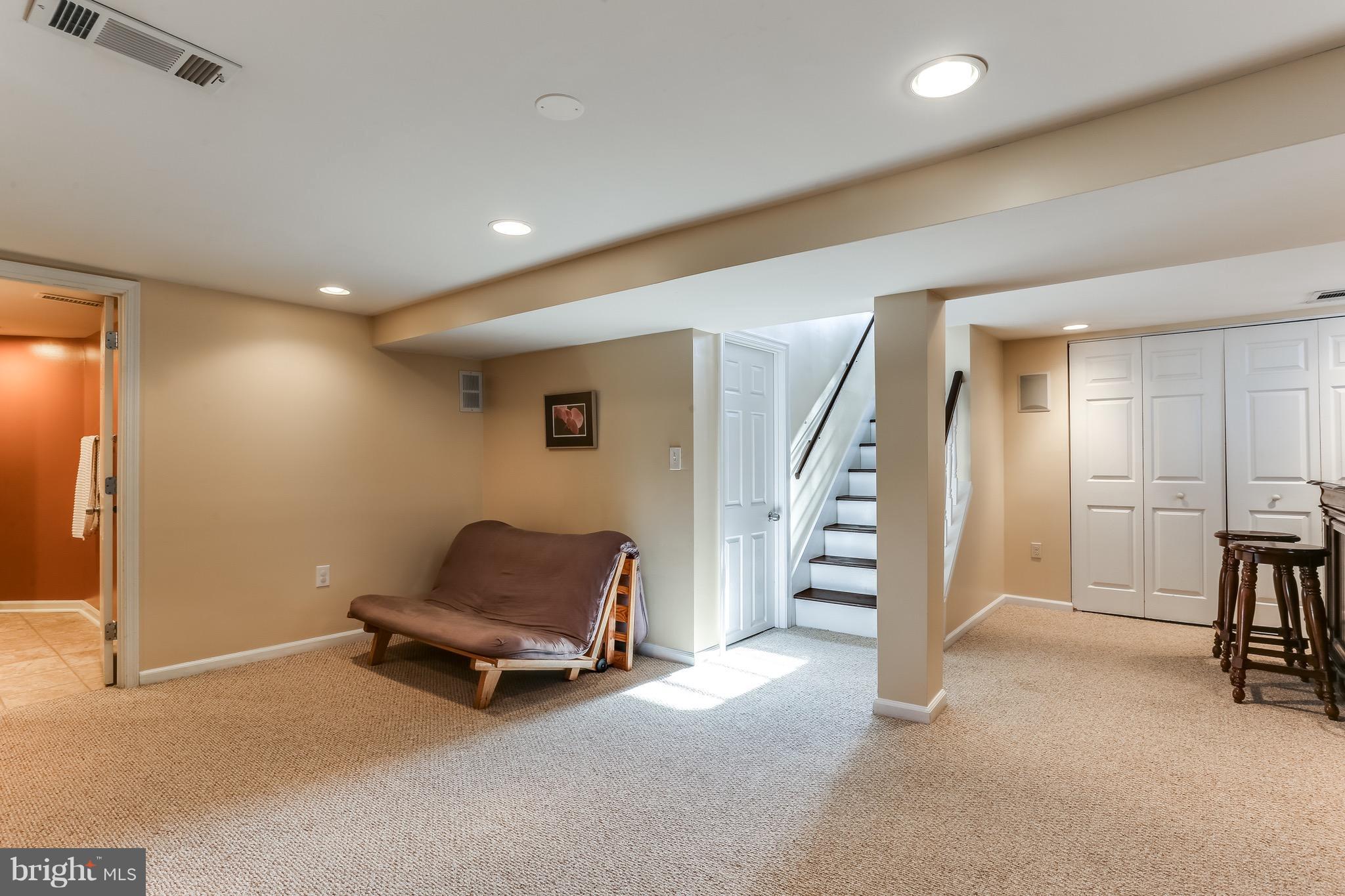 2015 Oakland Road Baltimore, MD 21220 - Photo 5 of 30 Lower Level Family Room w/ Sep. Laundry Room