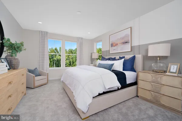 a bed room with a bed and a couch