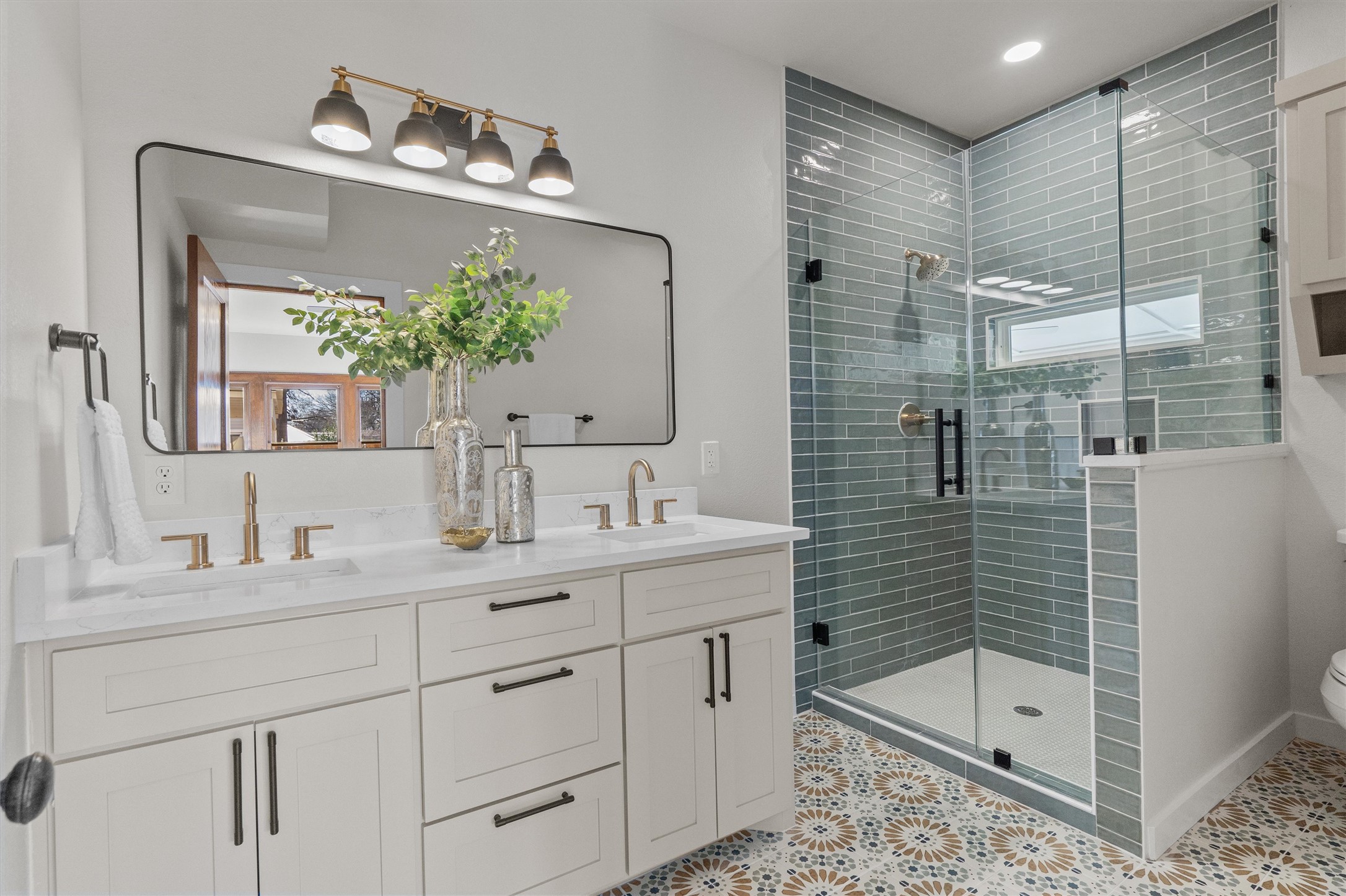 1605 South Austin Avenue Georgetown, TX 78626 - Photo 17 of 40 Full bath with double vanity, a shower stall, and recessed lighting