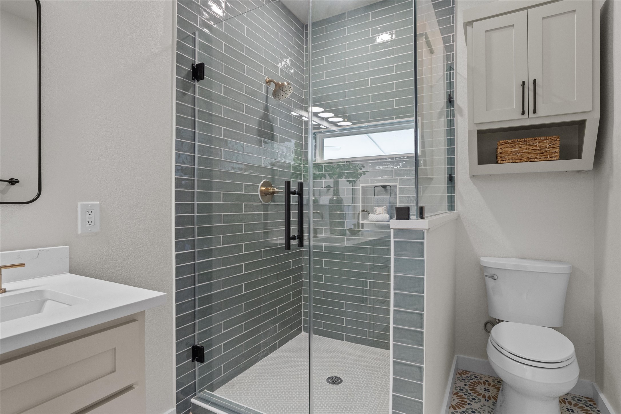 1605 South Austin Avenue Georgetown, TX 78626 - Photo 18 of 40 Full bathroom featuring vanity and a shower stall