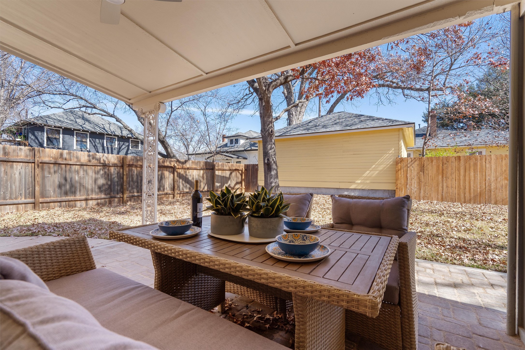 1605 South Austin Avenue Georgetown, TX 78626 - Photo 28 of 40 Fenced backyard featuring a patio, outdoor furniture, and a ceiling fan
