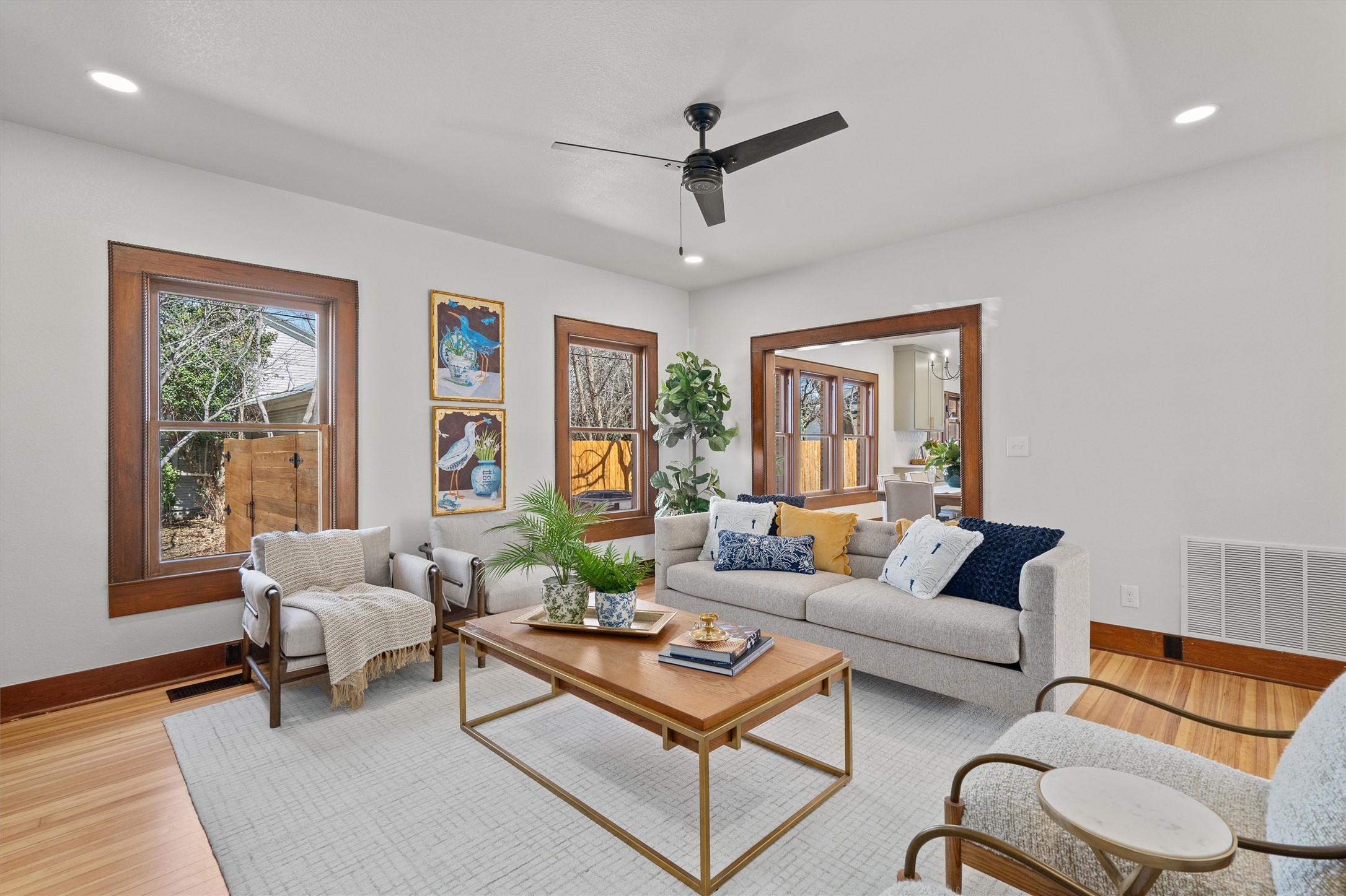 1605 South Austin Avenue Georgetown, TX 78626 - Photo 7 of 40 Living area with light wood-style floors, recessed lighting, and ceiling fan