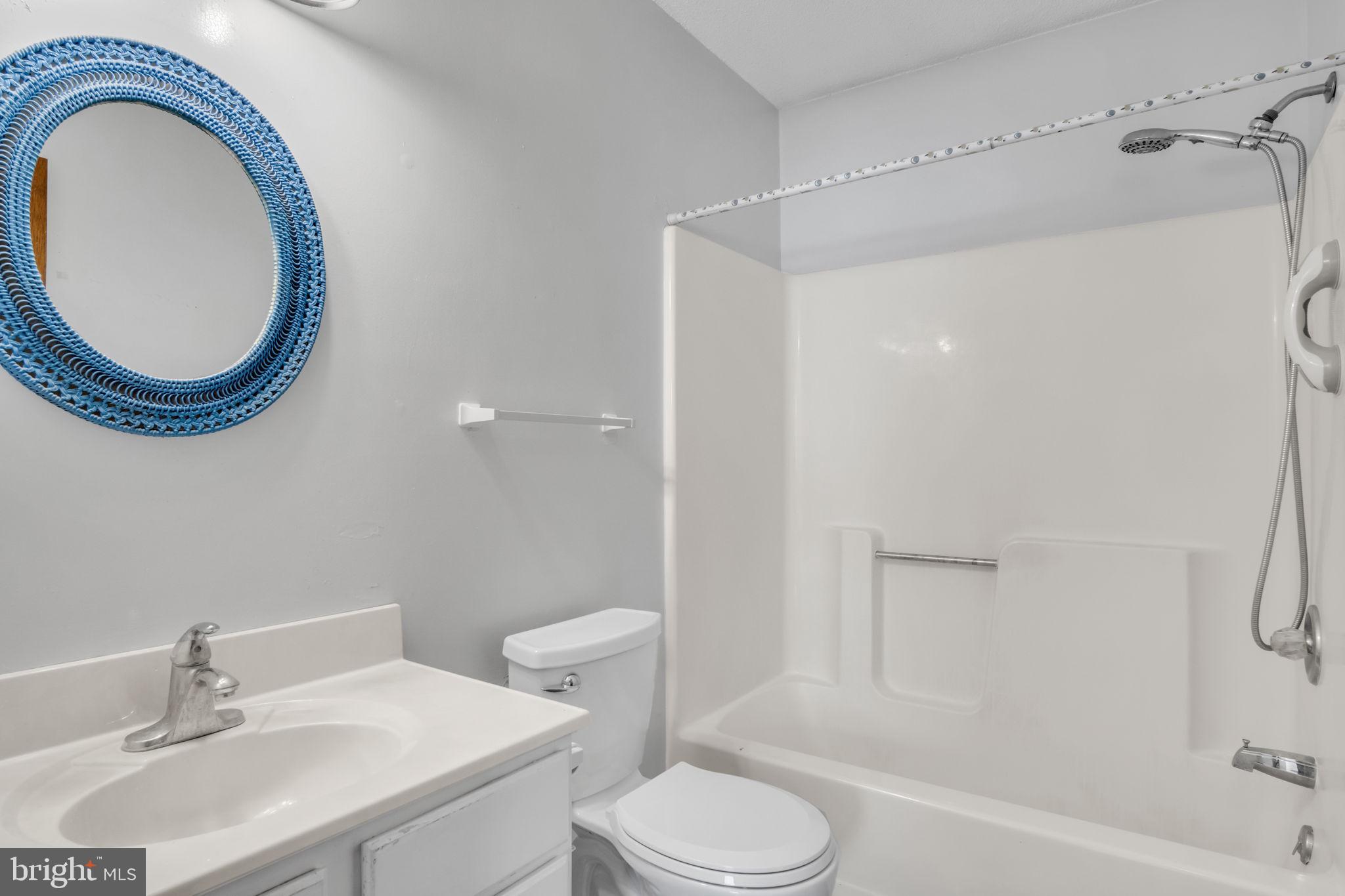 1575 Church Road York, PA 17408 - Photo 13 of 32 a bathroom with a sink a toilet and a mirror