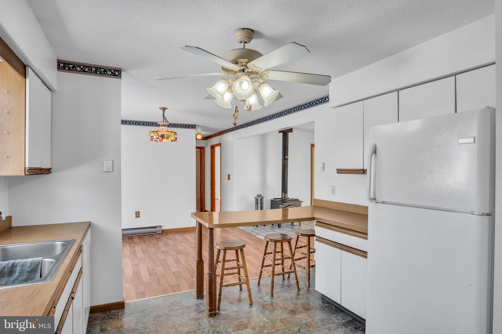1575 Church Road York, PA 17408 - Photo 3 of 32 a kitchen with cabinets and stainless steel appliances