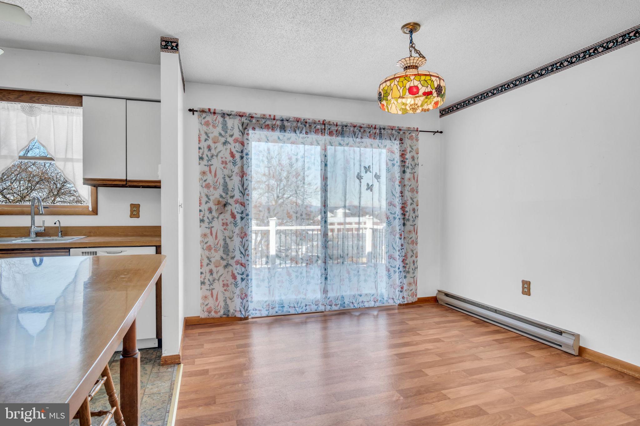 1575 Church Road York, PA 17408 - Photo 8 of 32 wooden floor in an empty room with a window