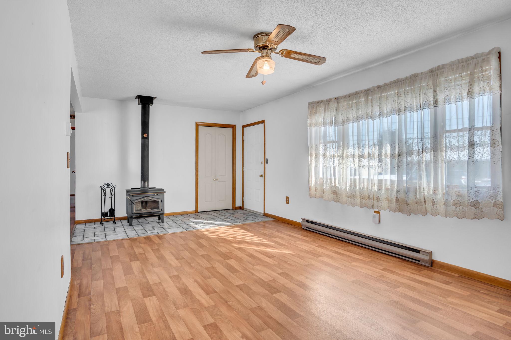 1575 Church Road York, PA 17408 - Photo 9 of 32 a view of empty room with a window and ceiling fan