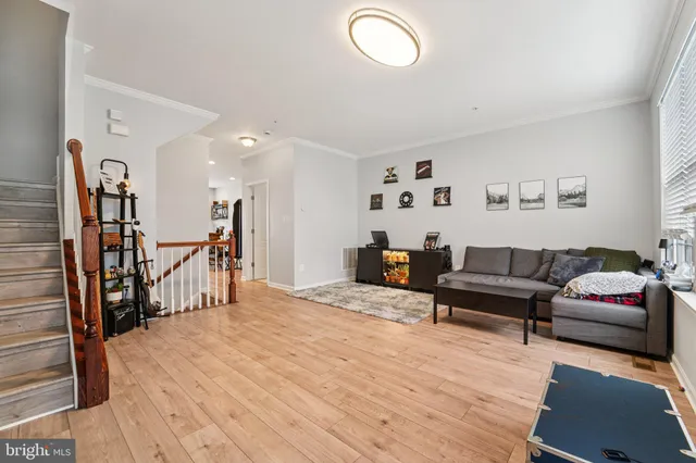 a bathroom with a sink toilet and a mirror