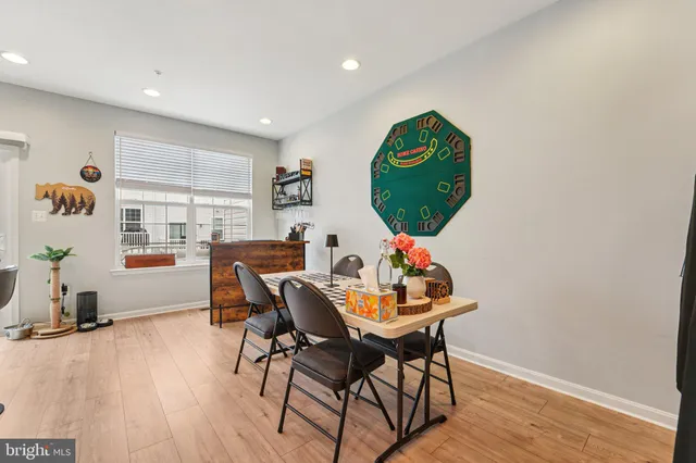 a picture of a bench in front of a wall