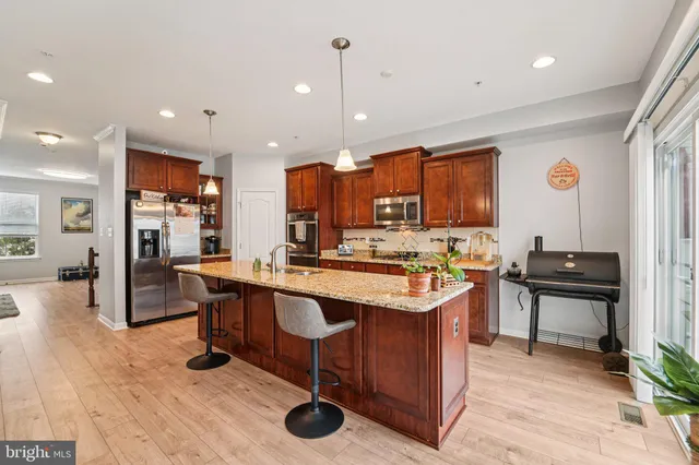 a bed room with a bed and a chandelier