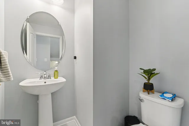 a bathroom with a double vanity sink mirror double vanity and bathtub