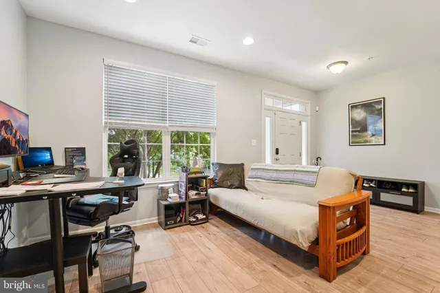 a workspace with furniture and window