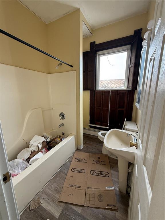 324 West New Castle Street Butler, PA 16001 - Photo 11 of 16 a bathroom with a sink and a mirror