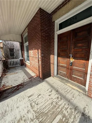 a view of backyard with deck