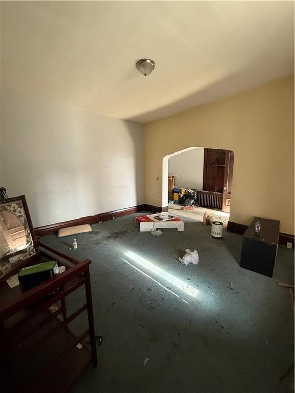 324 West New Castle Street Butler, PA 16001 - Photo 5 of 16 a living room with furniture and a flat screen tv
