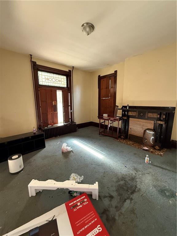 324 West New Castle Street Butler, PA 16001 - Photo 6 of 16 a living room with furniture and a flat screen tv