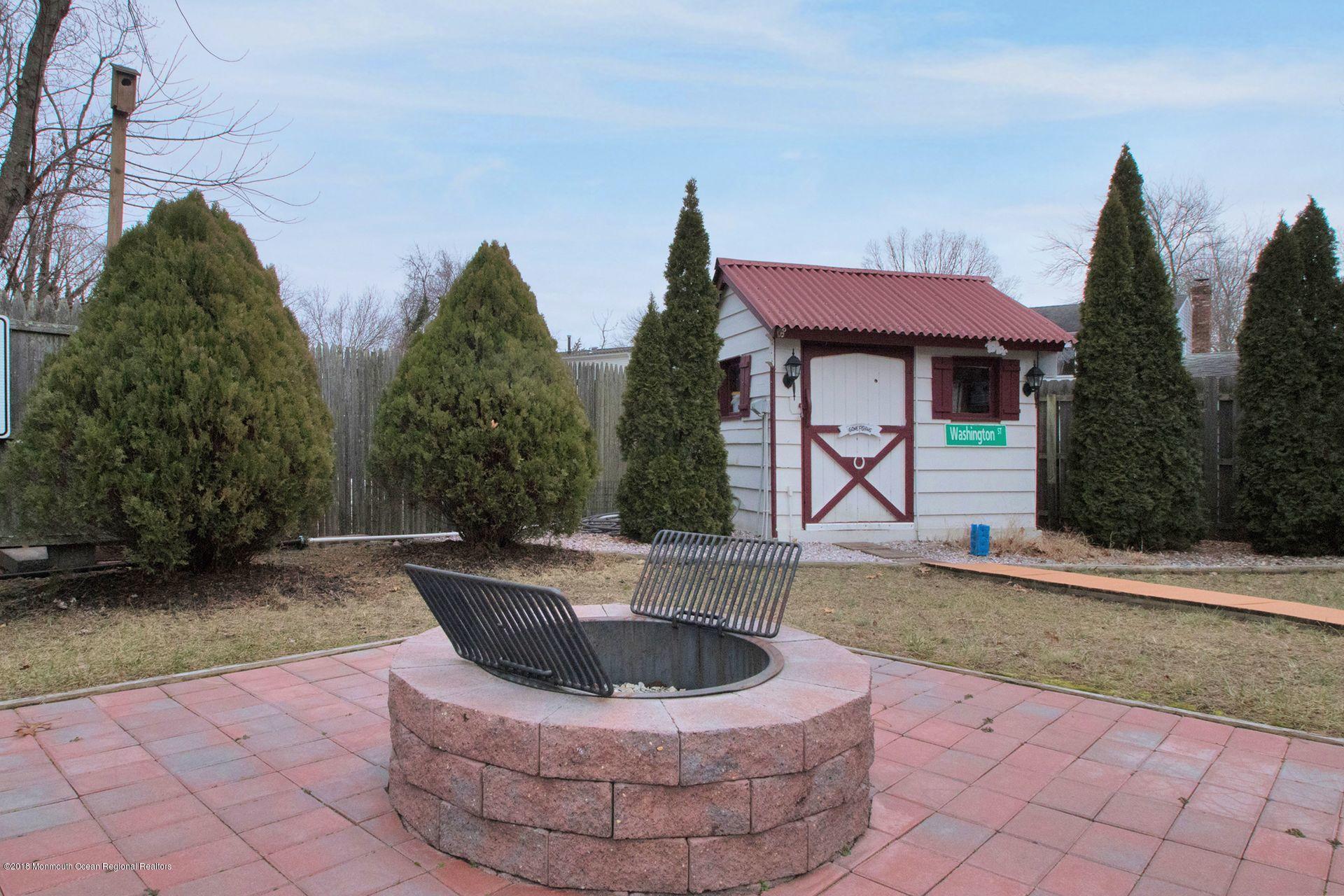 353 Old Squan Road Brick, NJ 08724 - Photo 25 of 27 Fire pit and shed