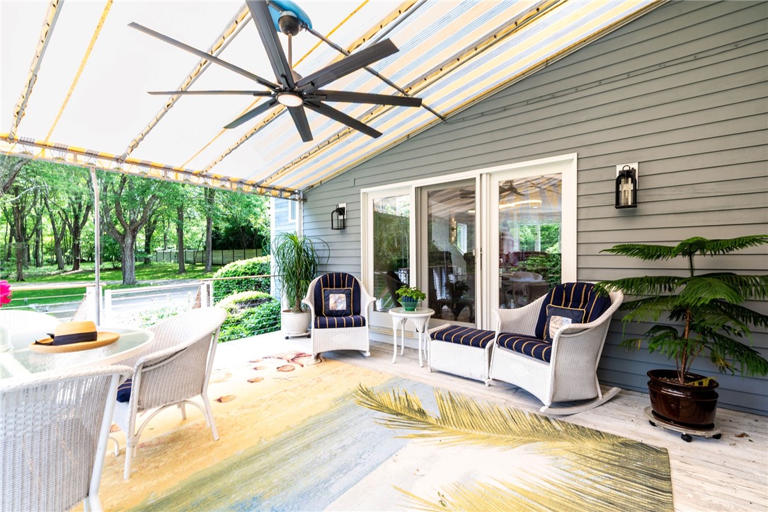 48 Wright Lane Jamestown, RI 02835 - Photo 15 of 48 South facing deck has lovely canvas awning to provide shade for the warm summer days