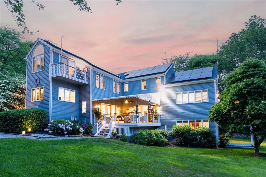 48 Wright Lane Jamestown, RI 02835 - Photo 2 of 48 Twilight photo of covered deck