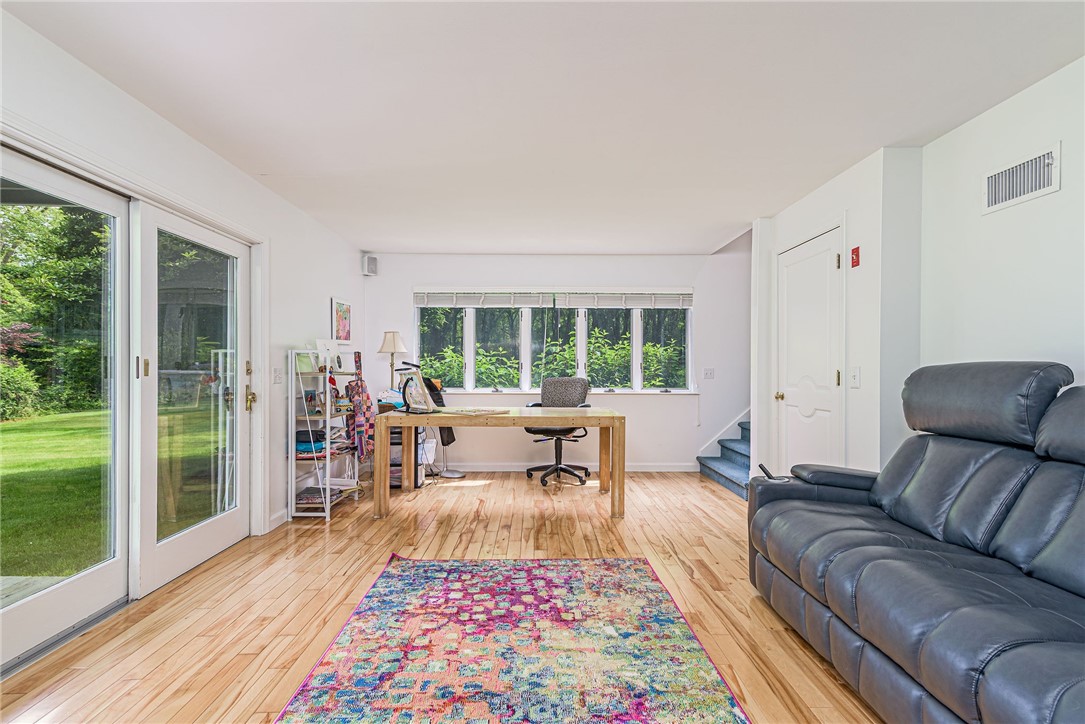 48 Wright Lane Jamestown, RI 02835 - Photo 29 of 48 Craft room with walk out to the expansive lawn