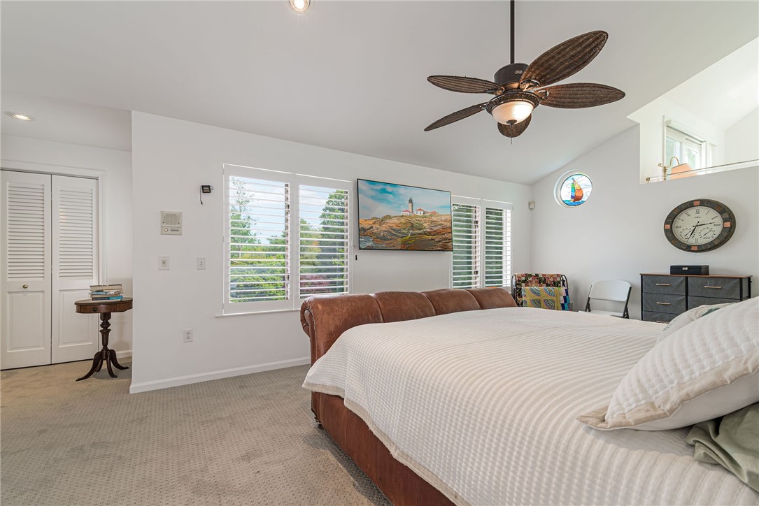 48 Wright Lane Jamestown, RI 02835 - Photo 32 of 48 Primary bedroom with east facing windows for morning sunrises