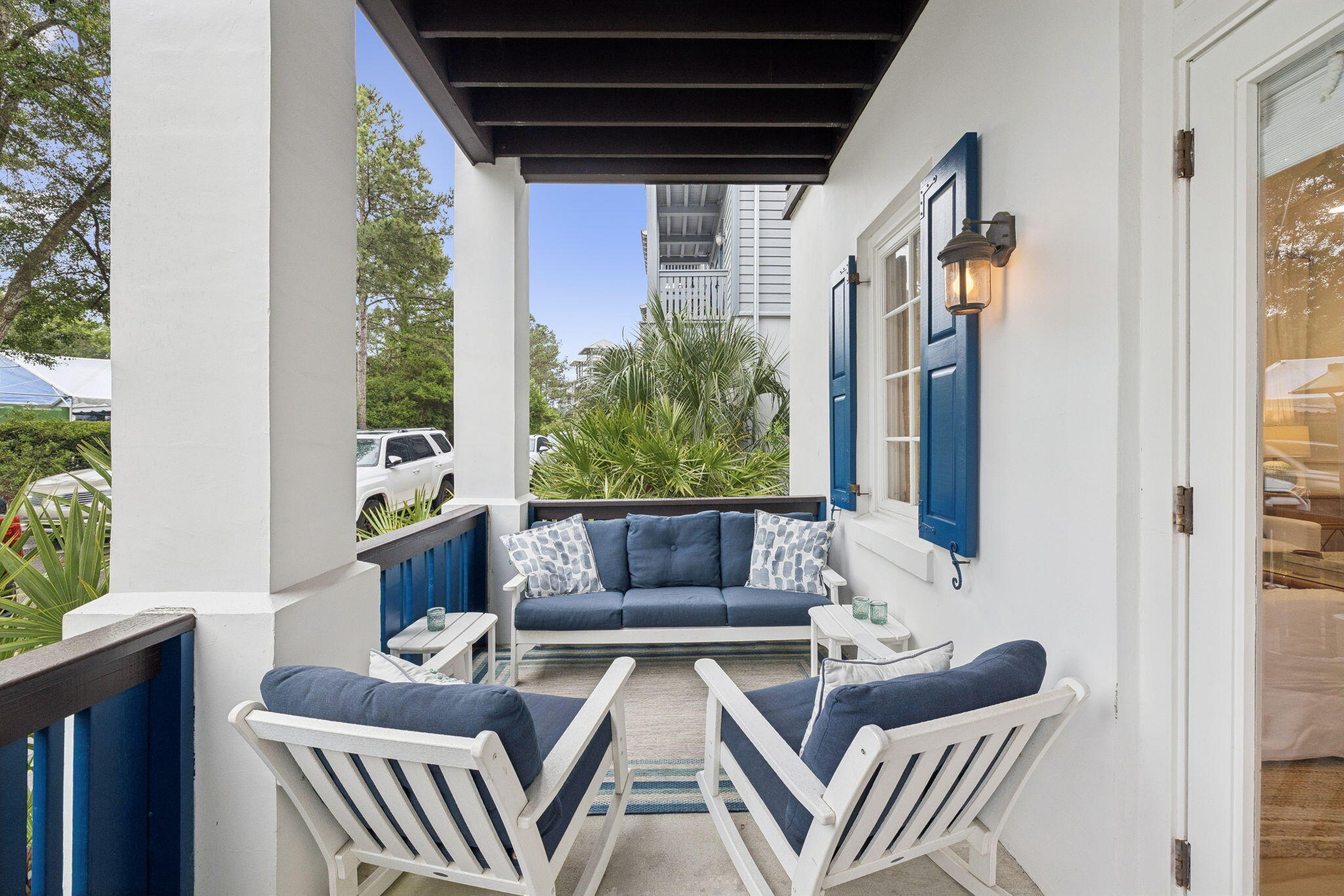 45 St Augustine Street, Unit 9101 Inlet Beach, FL 32461 - Photo 31 of 32 a living room with furniture and a potted plant