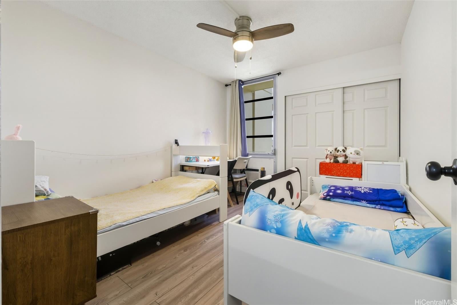 3161 Ala Ilima Street, Unit 1616 Honolulu, HI 96818 - Photo 12 of 23 a bedroom with furniture and window