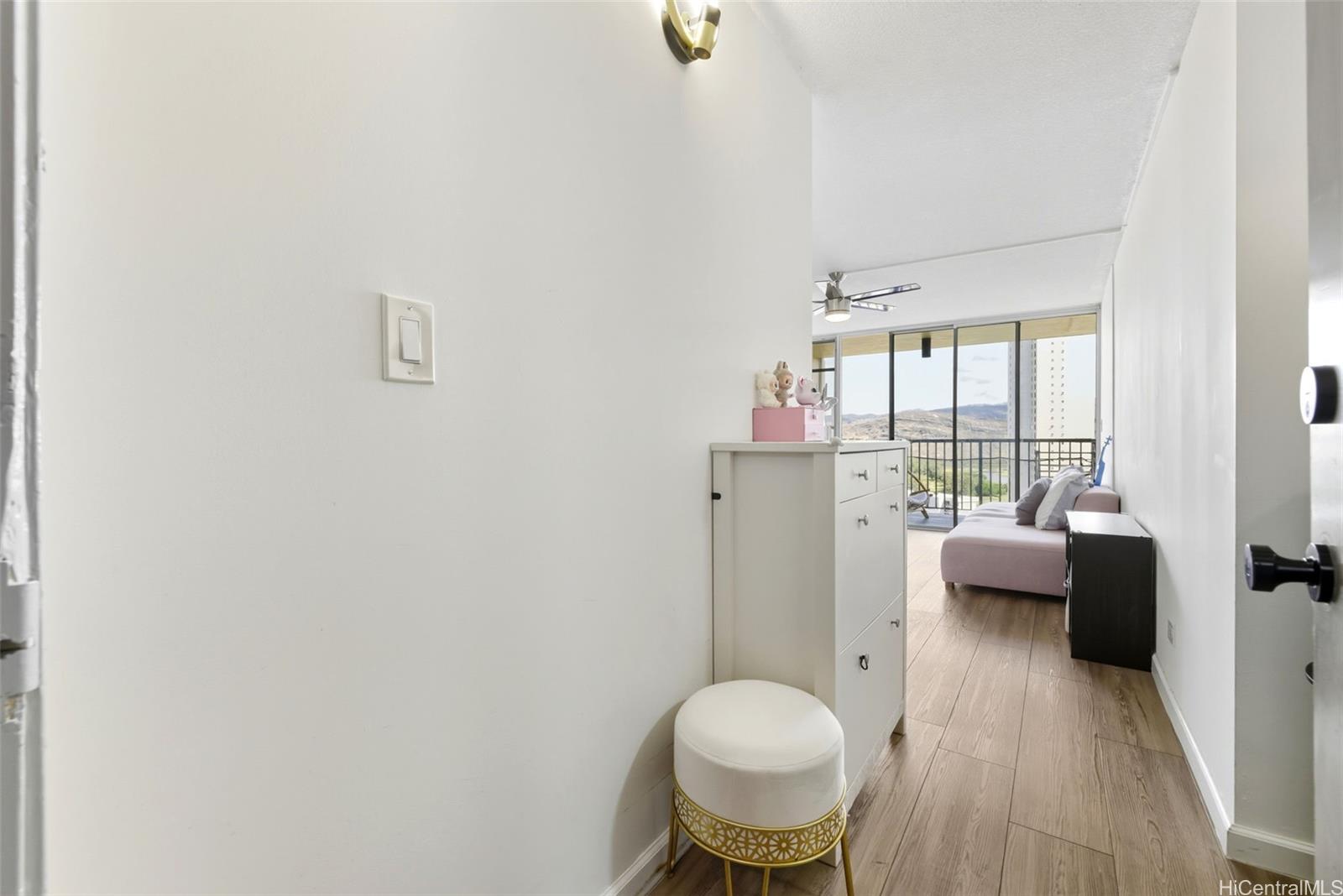 3161 Ala Ilima Street, Unit 1616 Honolulu, HI 96818 - Photo 3 of 23 a view of living room with furniture and wooden floor