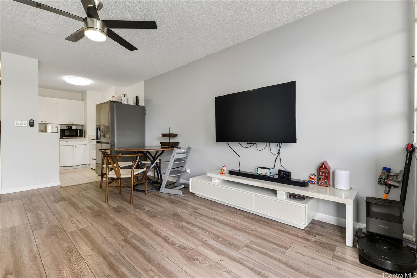 3161 Ala Ilima Street, Unit 1616 Honolulu, HI 96818 - Photo 5 of 23 a living room with furniture and a flat screen tv