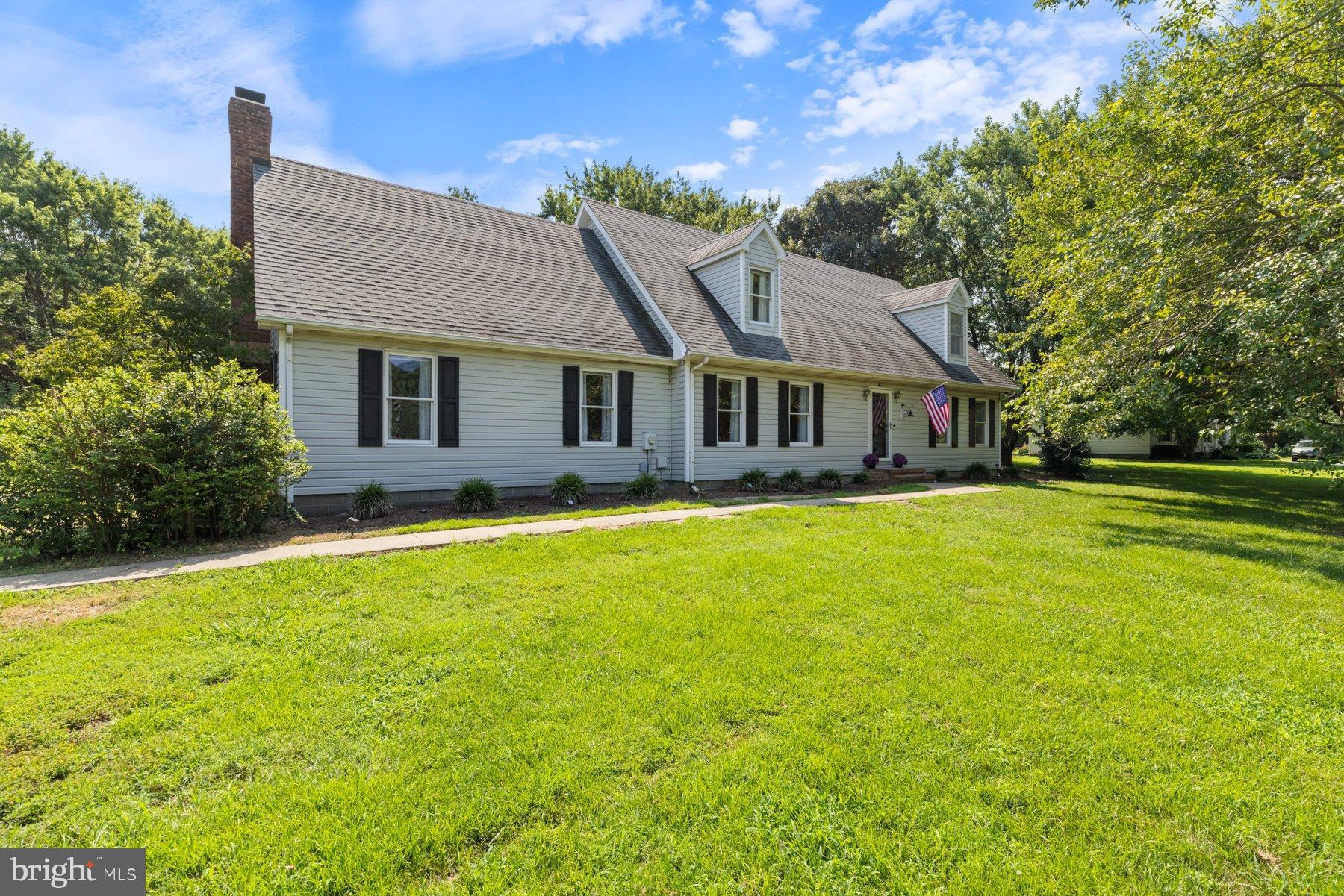 6705 Tilghman Island Road Sherwood, MD 21665 - Photo 41 of 41 a front view of house with yard and green space