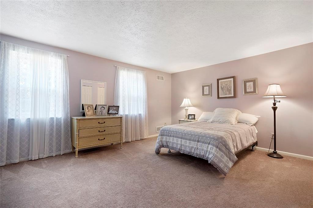 3066 East Bardonner Road Gibsonia, PA 15044 - Photo 13 of 18 Bedroom 2 is very large, with two big windows and plush carpeting.