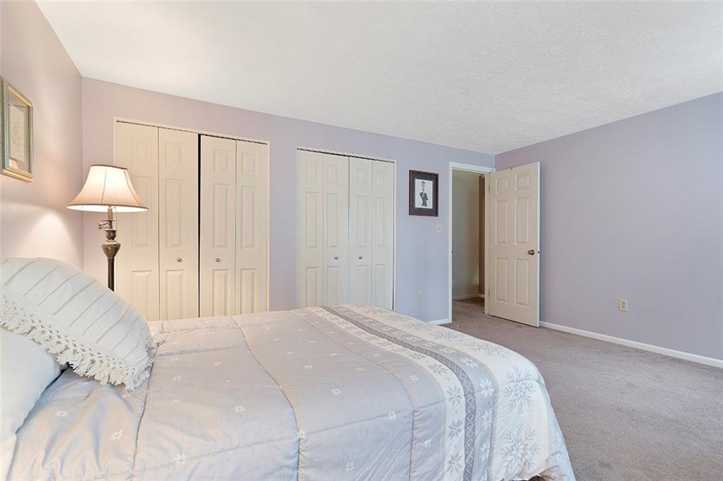 3066 East Bardonner Road Gibsonia, PA 15044 - Photo 14 of 18 Bedroom 2 features two double closets and cool neutral paint.
