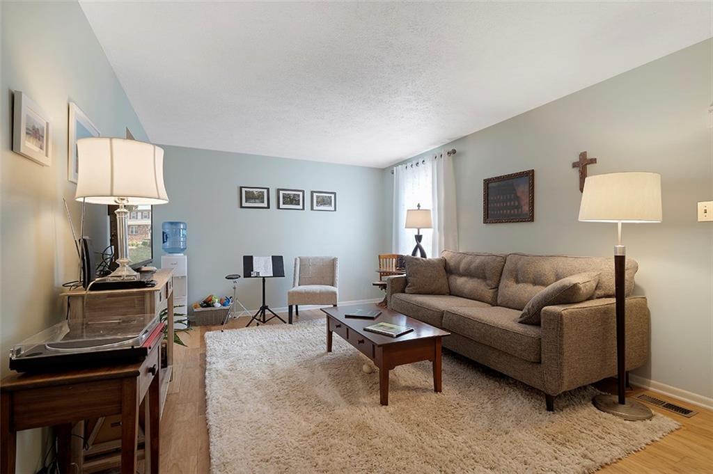 3066 East Bardonner Road Gibsonia, PA 15044 - Photo 7 of 18 Living room allows for many furniture options and lots of space.