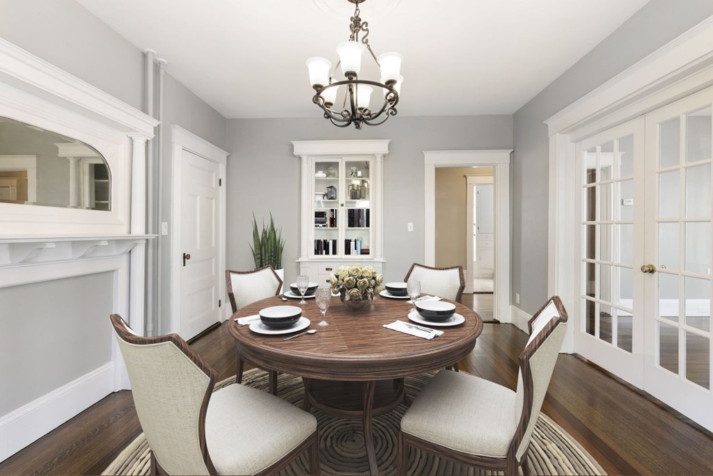 48 Rice Street, Unit 1 Cambridge, MA 02140 - Photo 2 of 16 a view of a dining room with furniture window and wooden floor
