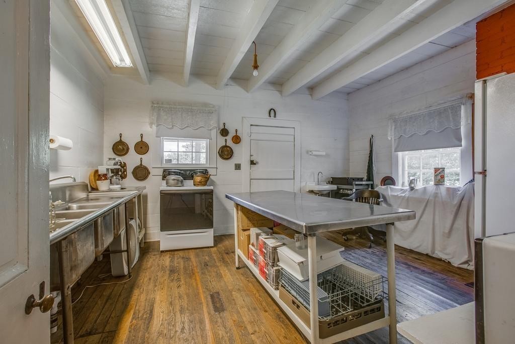 2536 Duplex Road Spring Hill, TN 37174 - Photo 15 of 32 a kitchen with granite countertop a stove a sink dishwasher and a refrigerator