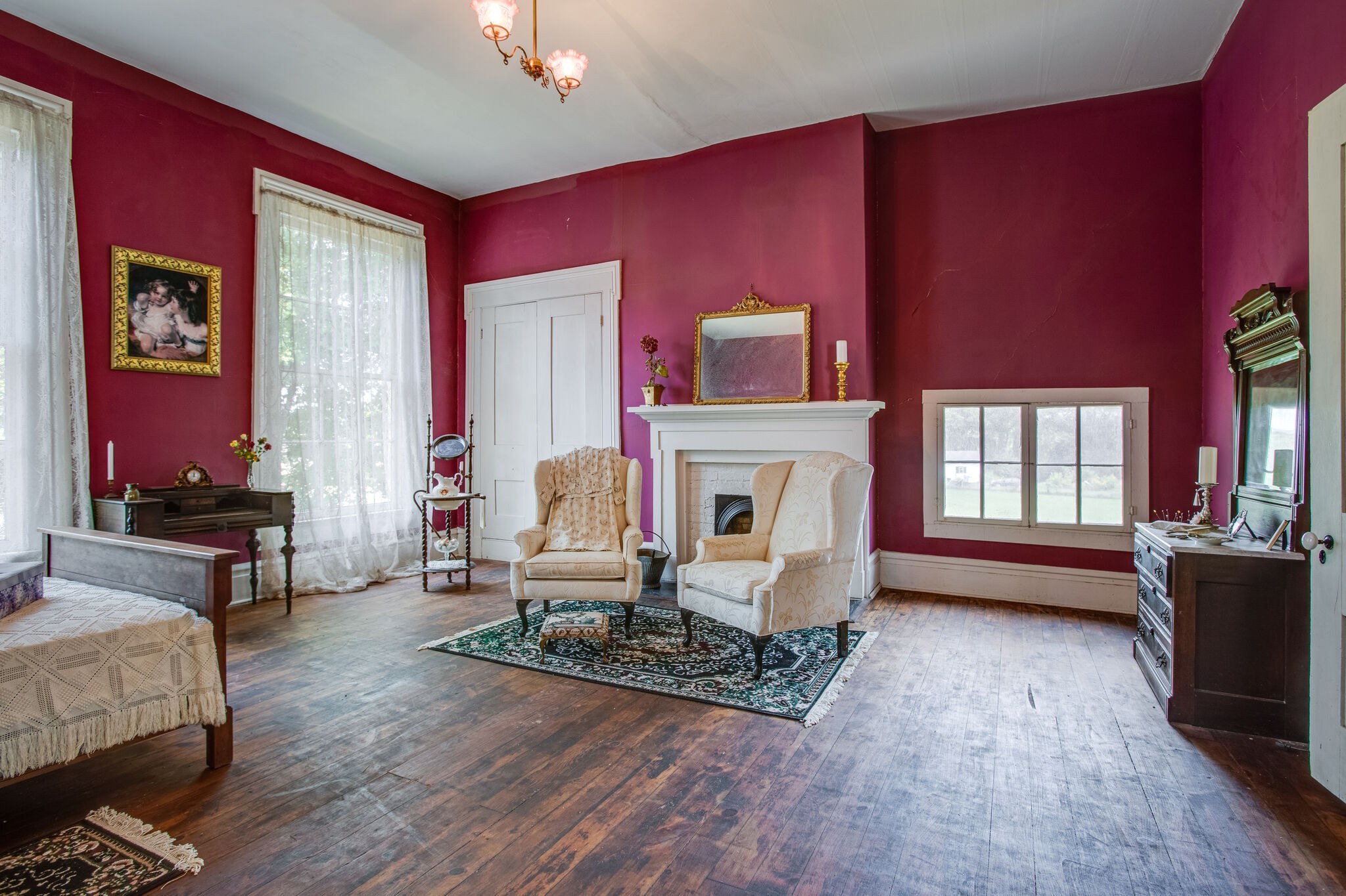 2536 Duplex Road Spring Hill, TN 37174 - Photo 16 of 32 a living room with furniture a fireplace and a flat screen tv