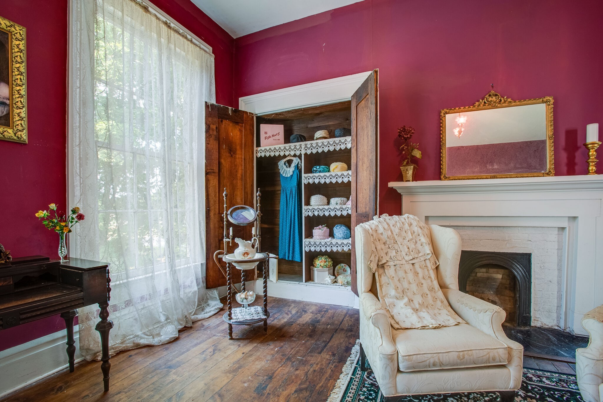 2536 Duplex Road Spring Hill, TN 37174 - Photo 18 of 32 a living room with furniture a fireplace and a flat screen tv