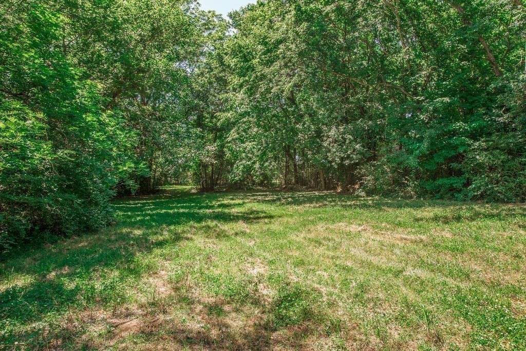 2536 Duplex Road Spring Hill, TN 37174 - Photo 28 of 32 a view of outdoor space with deck and yard