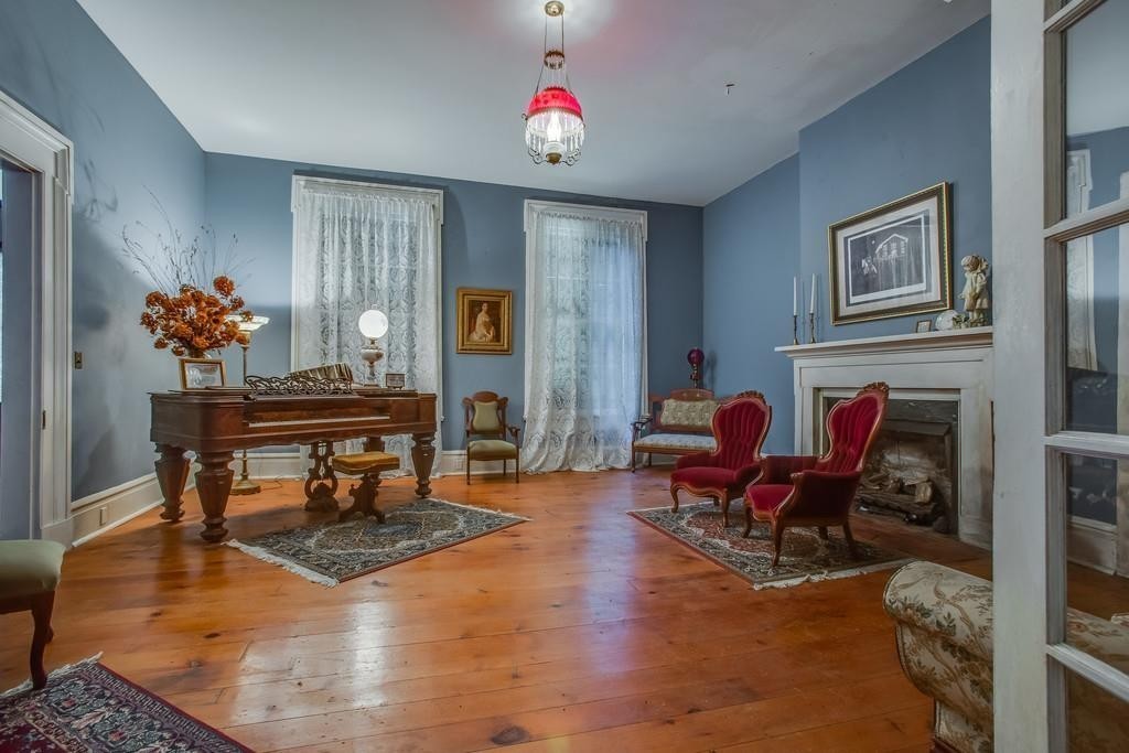2536 Duplex Road Spring Hill, TN 37174 - Photo 9 of 32 a living room with furniture and a wooden floor
