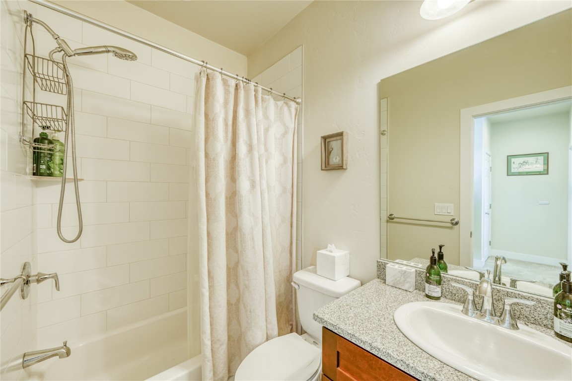 29 Haymaker Street, Unit 2B Silverthorne, CO 80498 - Photo 12 of 28 Full bathroom featuring toilet, shower / bathtub combination with curtain, and vanity