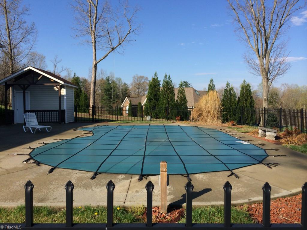 175 Sourwood Road State Road, NC 28676 - Photo 18 of 24 View of the pool and pool equipment house. Anticipation awaits the uncovering of the pool.