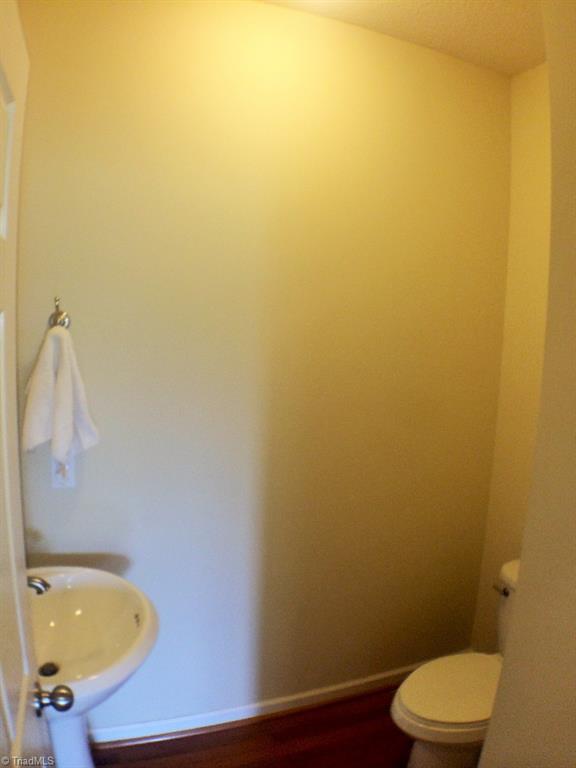 Guest half bath in the hallway.