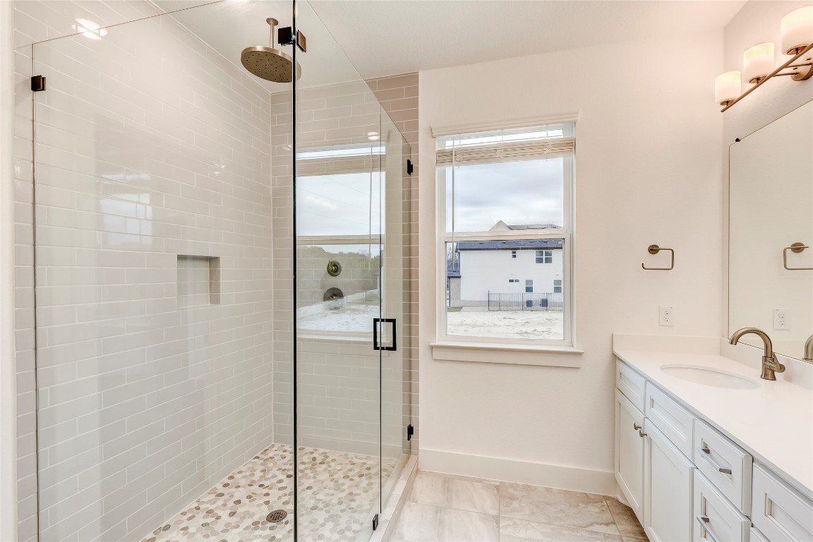 2000 Kit Circle Austin, TX 78758 - Photo 23 of 34 Full bath featuring vanity and a shower stall