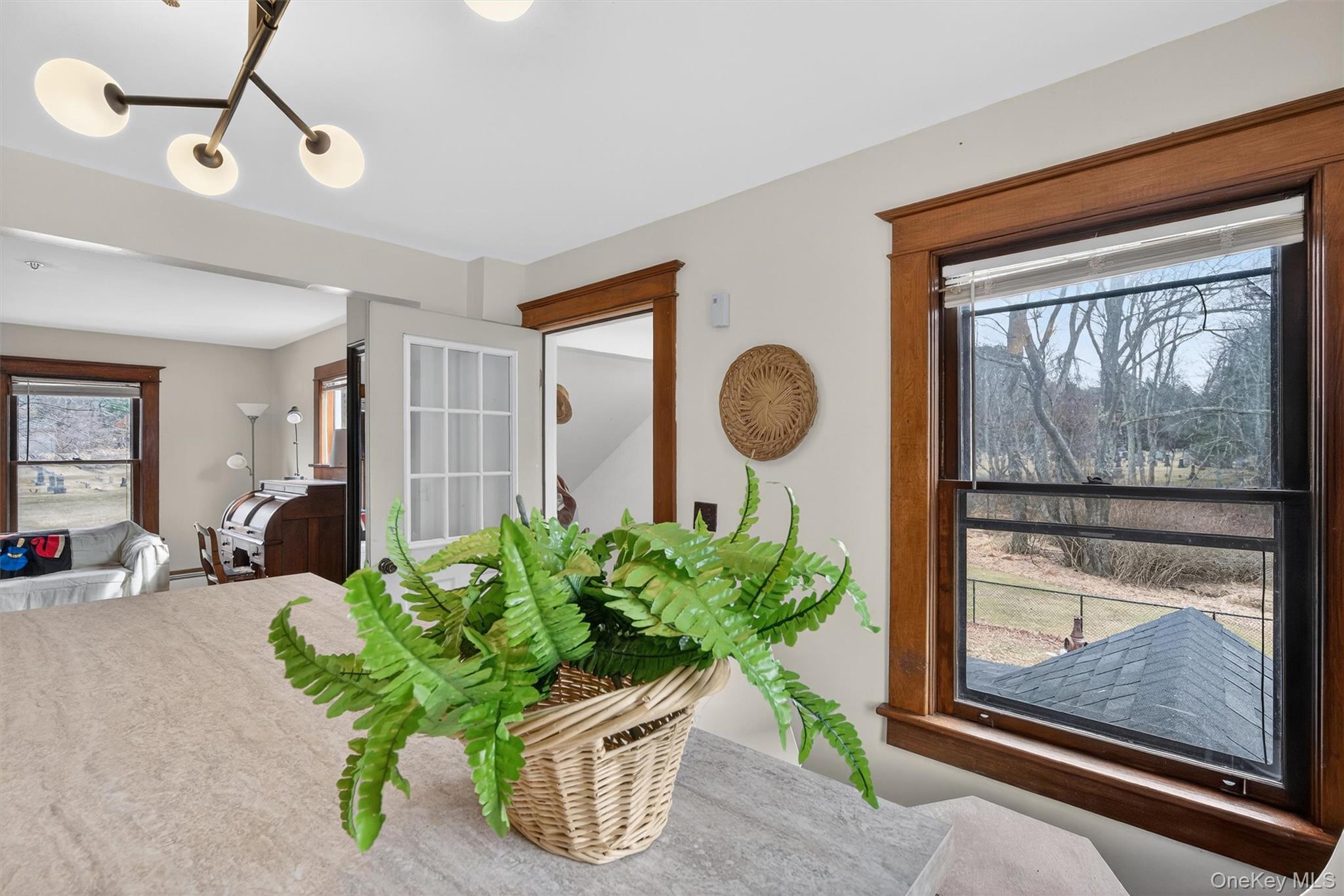 48 Kirks Road Narrowsburg, NY 12764 - Photo 36 of 50 a room with potted plant and wooden floor